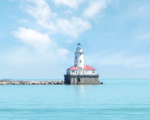 Lighthouse in Chicago, Illinois with added clouds, and blue water